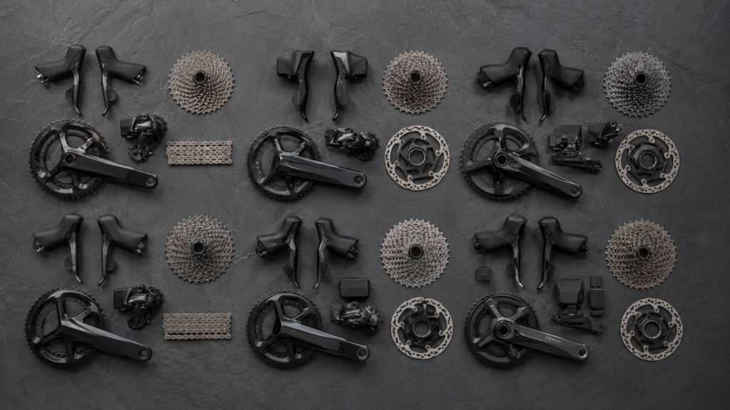 Bicycle drivetrain parts laid out neatly